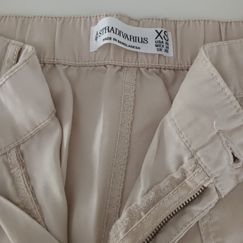 Women's pants pack of 3 like new, white and beige, size XS