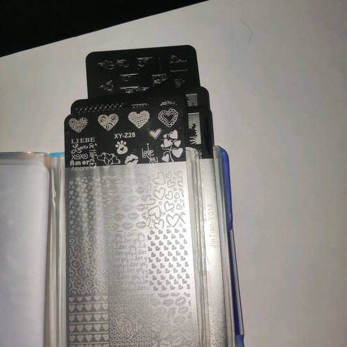 Nail stamping plates like new with storage book