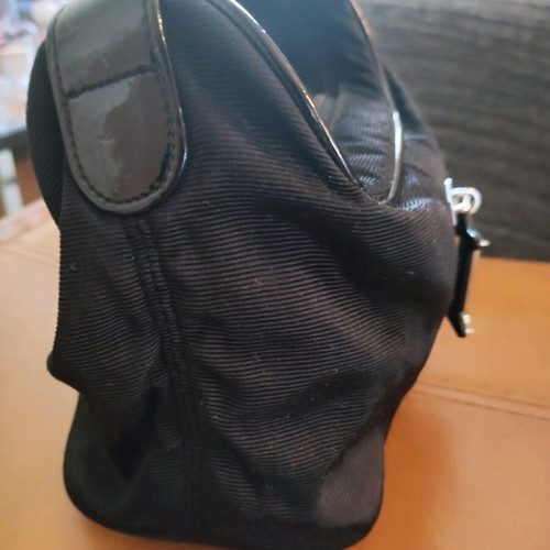 Dior small black hand bag like new with silver details