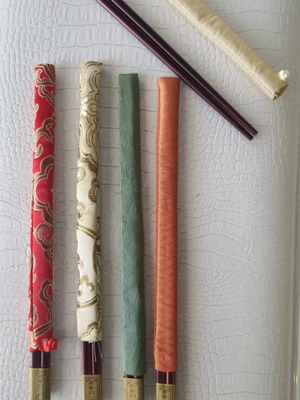 Chinese chopsticks like new with silk pouches