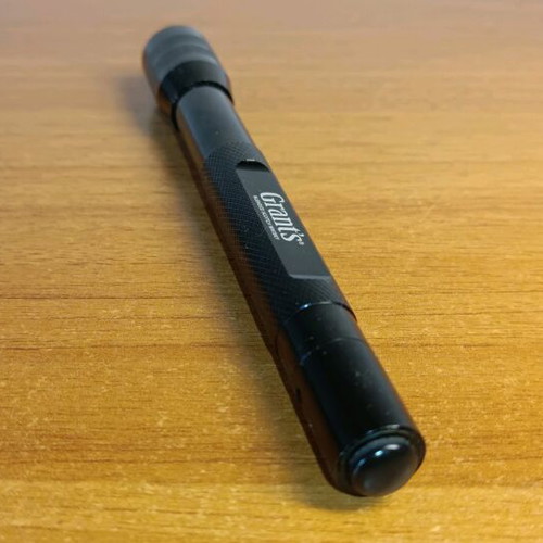Grant's collectible promotional flashlight used