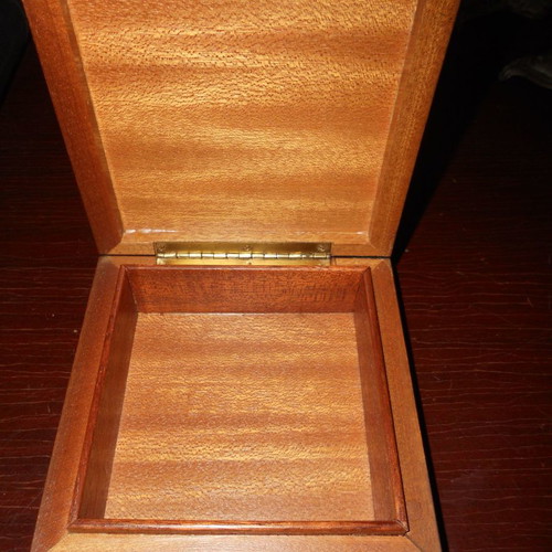 Wooden box used with car illustration on ceramic tile