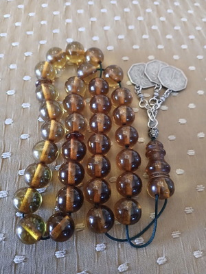 Worry beads like new with 33 round beads and bronze details