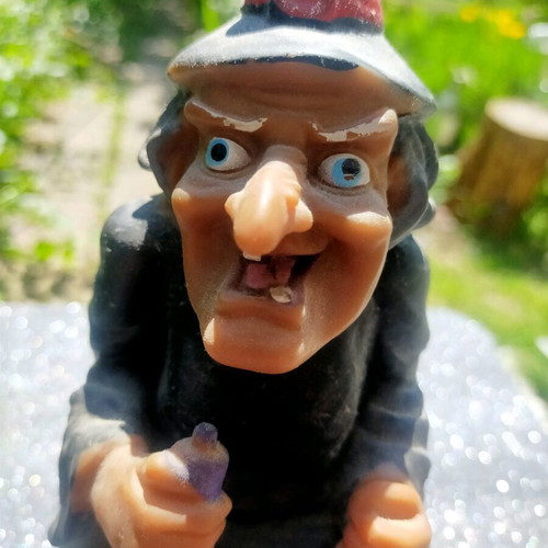 Angry witch figure used with music