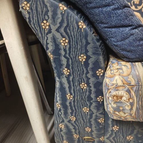 Two-seater sofa with storage compartment