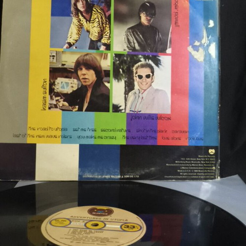 Adventures in Utopia vinyl record used, cover with tape