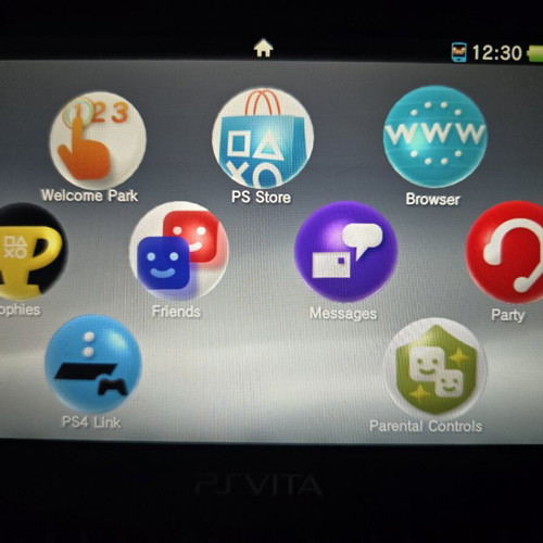 Sony PS Vita Slim console with 8GB card and games