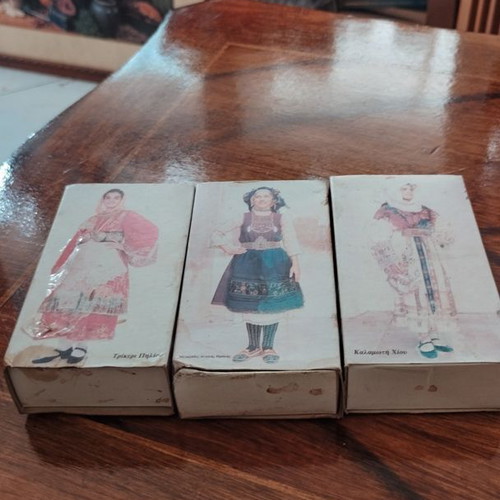 Vintage collectible matchboxes used with traditional Greek costumes