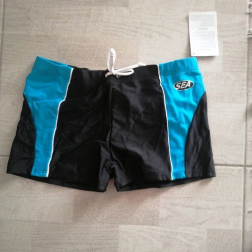 Children's swim trunks new, black and blue