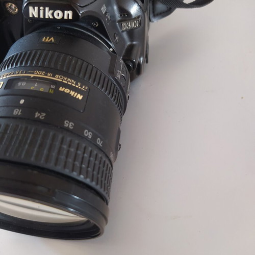 Nikon D3100 DSLR camera used with AF-S DX Nikkor 18-200mm f/3.5-5.6G ED VR lens