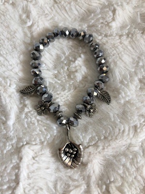 Bracelet with metallic beads and charms