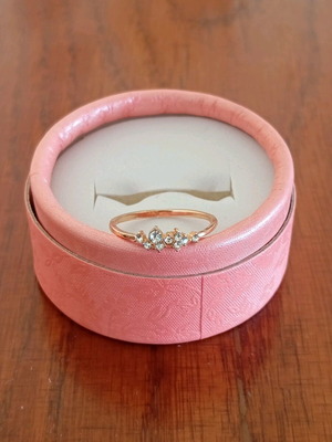 Gold plated ring with zircon stones, size 7