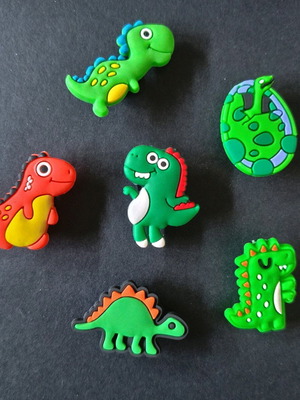 Crocs charms set with cute dinosaurs like new