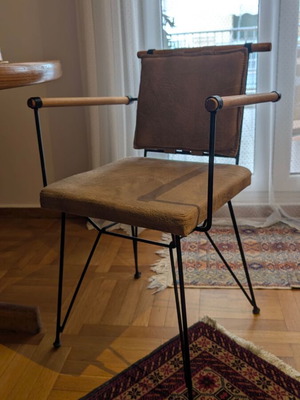 Industrial design chair like new with metal frame and wooden armrests