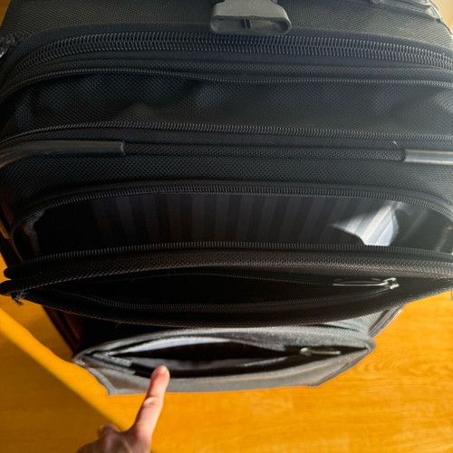 Delsey suitcase used with wheels small size black