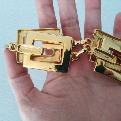 Metallic gold-plated belt with geometric design like new, 105 cm