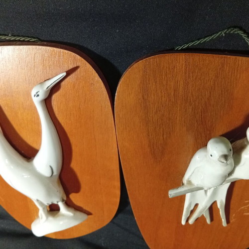 Wall panels used with wooden base and porcelain swallows and storks