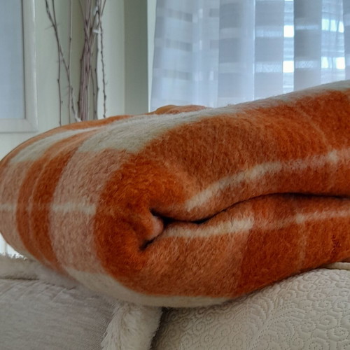 Wool blanket used, orange checkered bicolor