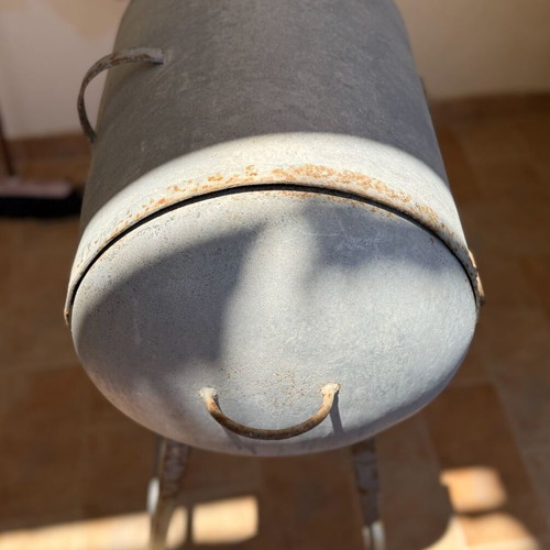 Handmade metal BBQ grill with lid used, industrial style