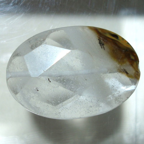 Quartz mineral with oxide inclusions like new