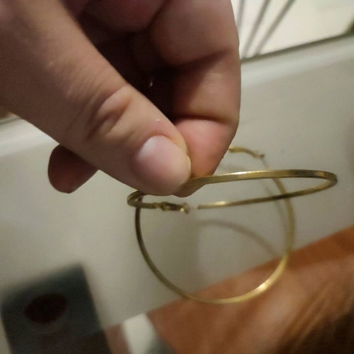 Hoop earrings used, two pairs, gold color