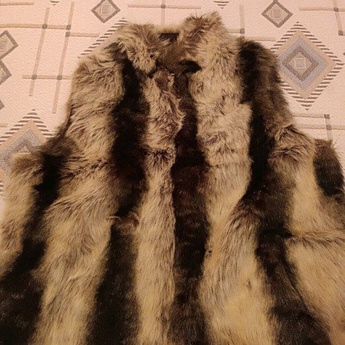 Fur sleeveless jacket new, black and beige