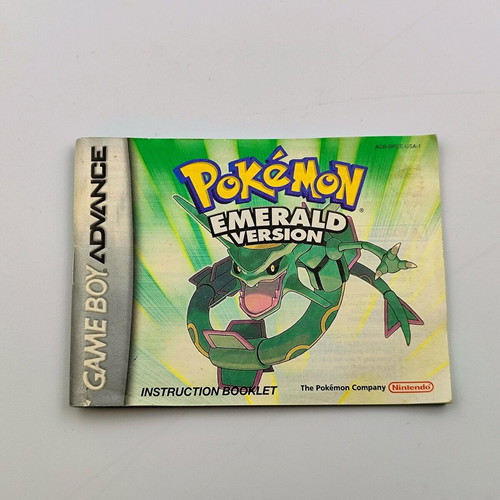 Pokemon Emerald Version for Game Boy Advance used with manual and poster