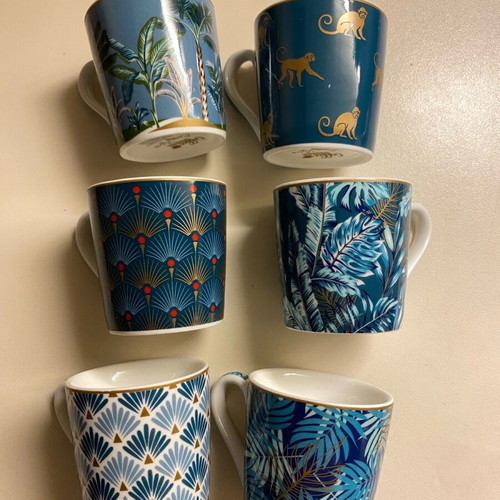 Coffee cup set used with one broken saucer