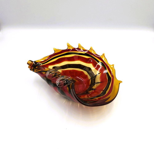 Glass ashtray used red with shell design