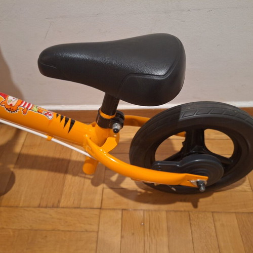 Balance bike for children, orange, adjustable height