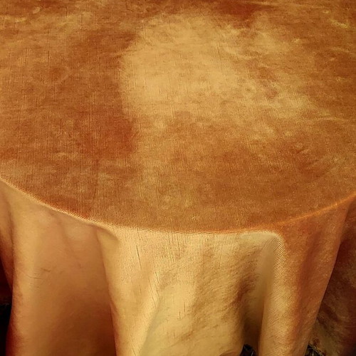 Velvet round tablecloth like new, gold mustard color with tassels