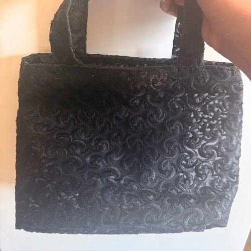 Mardium black handmade handbag used, spacious with swirling details
