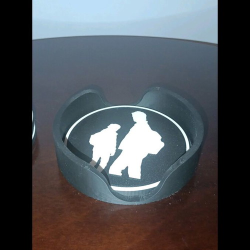 Last of Us coasters like new, set of 4 with base