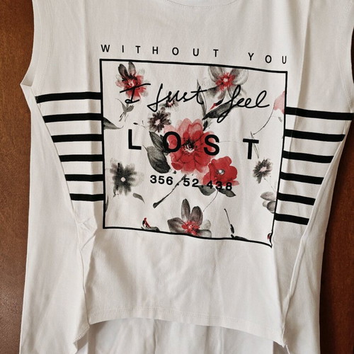 Women's asymmetrical sleeveless top like new, black and white, size M