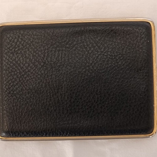 Classic cigarette case used, black leatherette with bronze interior