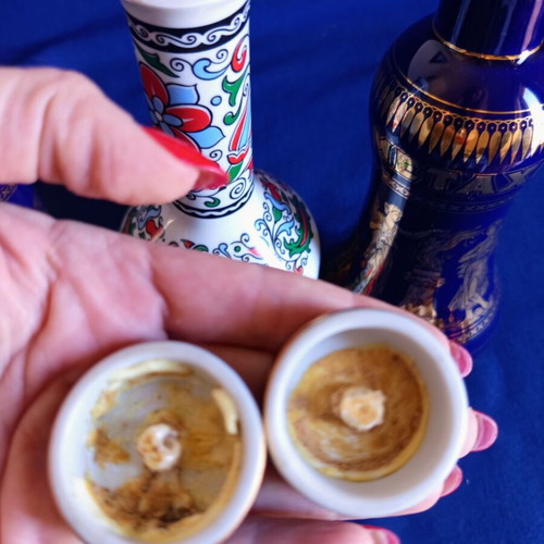 Metaxa porcelain bottles set of 3, like new, 18K gold and floral design