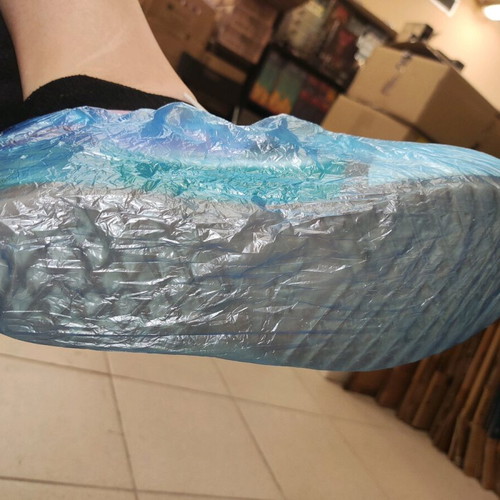 Disposable shoe covers new, pack of 50 pieces