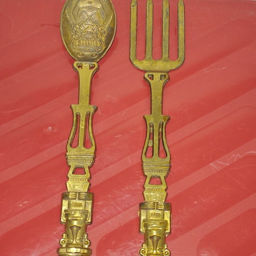 Vintage brass serving spoon and fork set with Aztec motifs