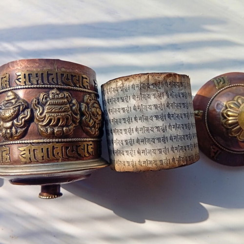 Tibetan prayer wheel used with original thin old paper