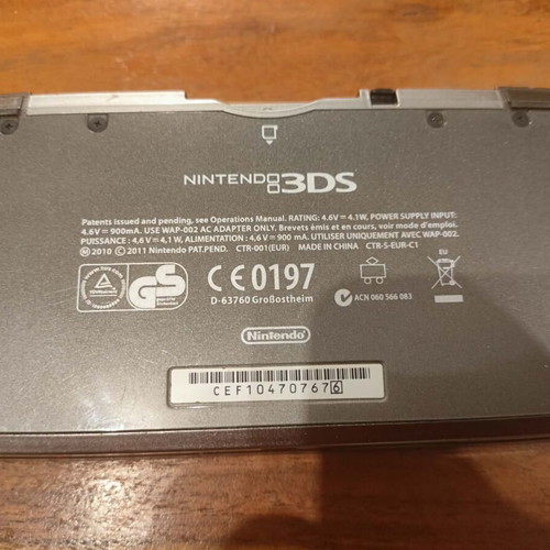 Nintendo 3DS console with charger, memory card and stylus