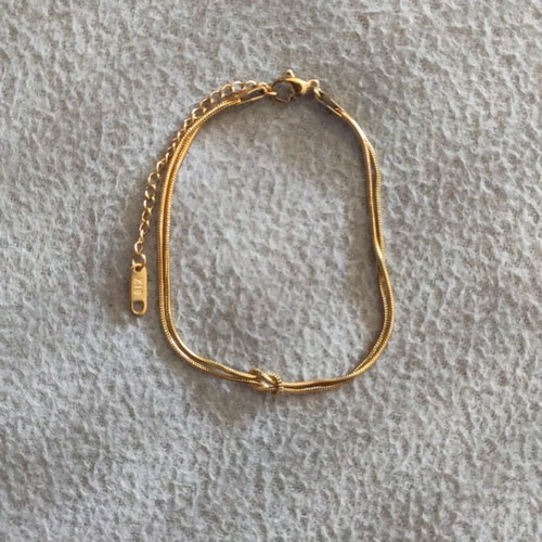 Infinity knot bracelet new, gold color stainless steel
