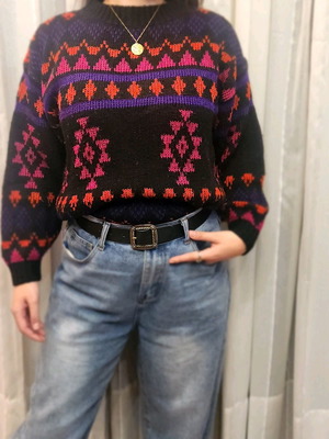 Black sweater with patterns used, multicolored