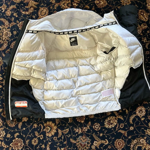Nike jacket used for girls size Medium with stain on hood
