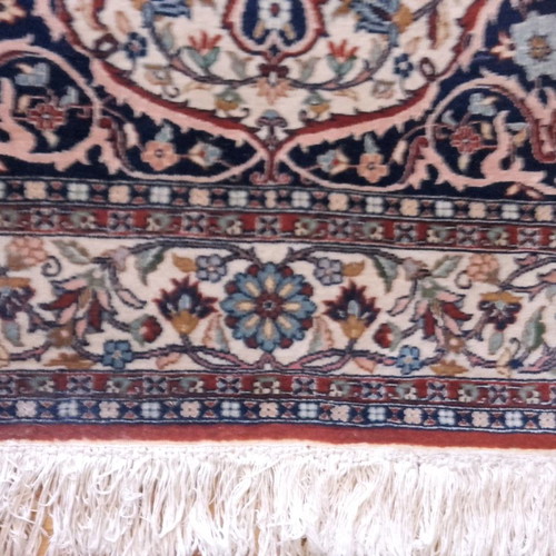 Handmade wool rug used, approximately 10 sqm