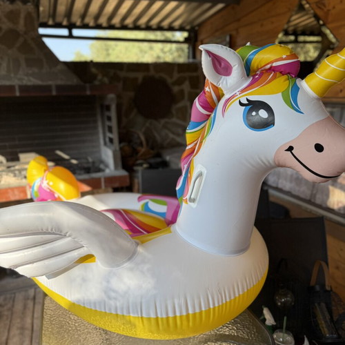 Inflatable Unicorn Pool Float like new, colorful rainbow design