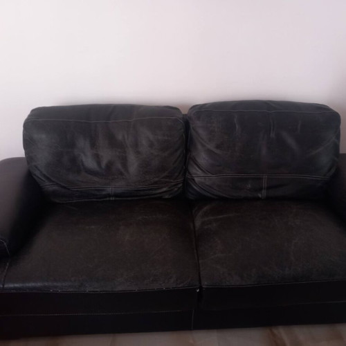 Two-seater leather sofa, medium condition