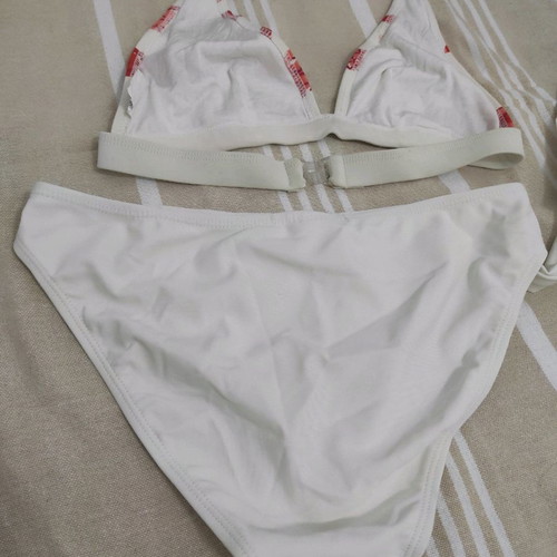 Bikini swimsuit white with orange details and sequins small in very good condition
