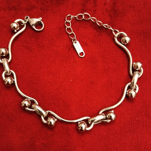 Stainless steel bracelet new, silver with intricate fastening
