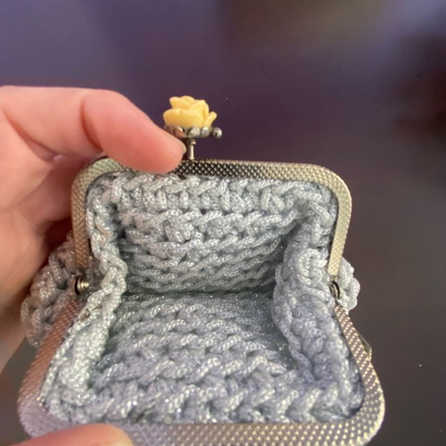 Handmade knitted wallet like new, medium size, silver with rose clip