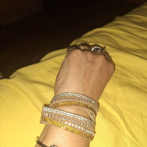 Bracelet with brown, orange, and silver clasp, like new